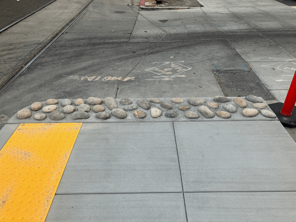 SacRT 8th & K station rocks at end and concealed drop